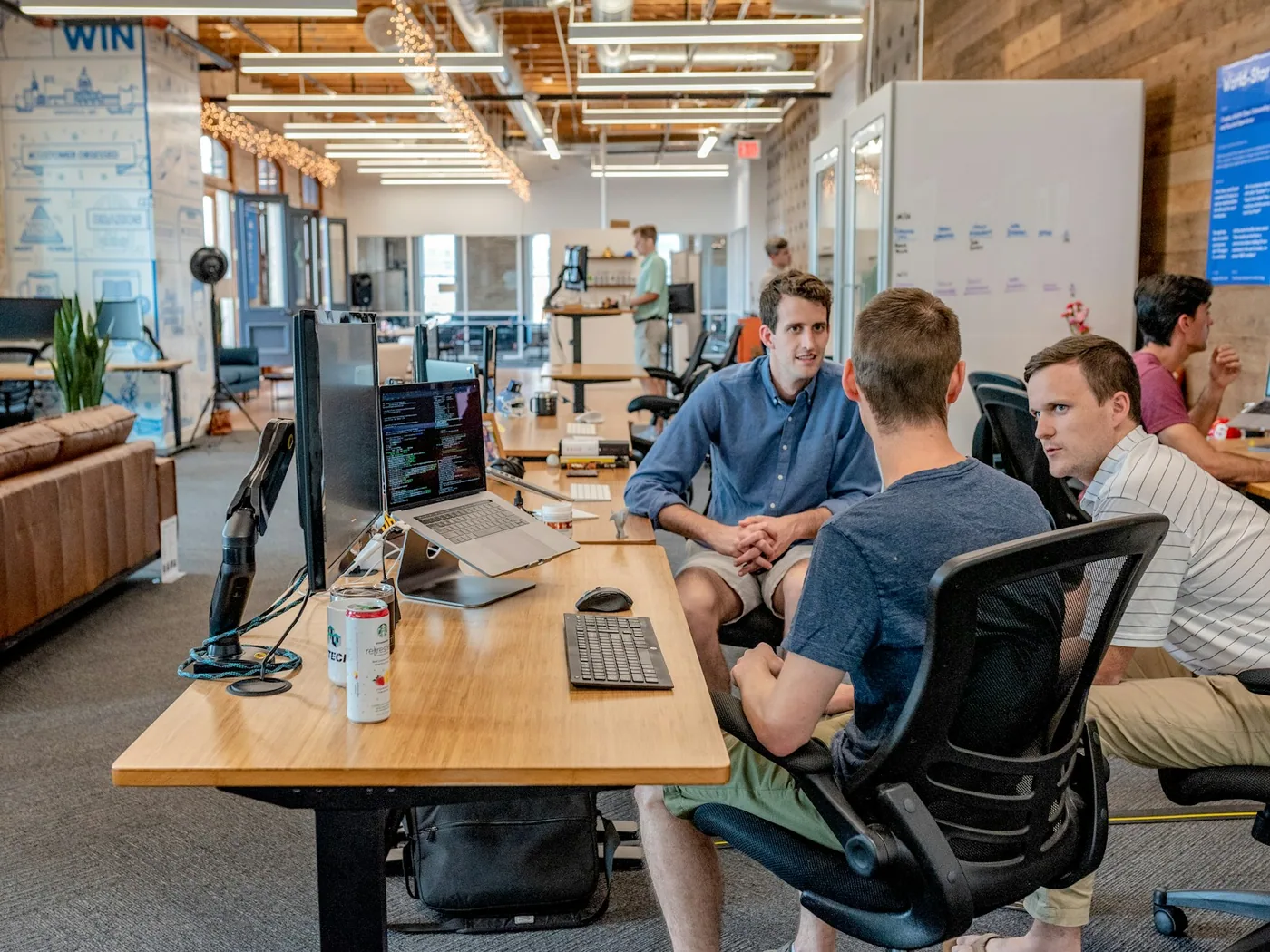 Operations team reviewing business workflows together